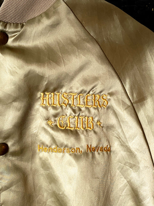 Chaqueta dorada "Hustlers Club"
