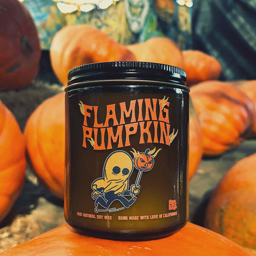 Sun City Rags, Flaming Pumpkin Candle 8 oz. Sweet smokey notes of caramel, pumpkin. Clean scent, phthalate free, non toxic ingredients. Soy Candle cotton wick, handmade, made in USA, local products. clean beauty product. Non hormone disrupting. non carcinogenic